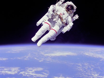 Bruce McCandless floating free of Space Shuttle Columbia