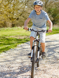 a child riding a bicycle