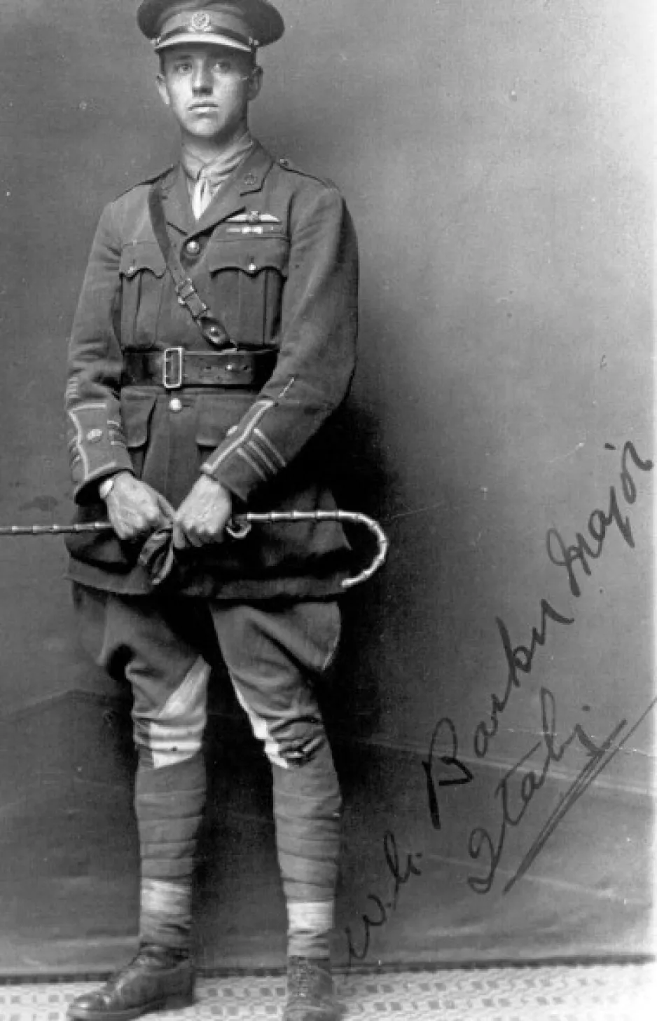 A full-body photo of William George Barker, with his autograph visible in the bottom right corner.
