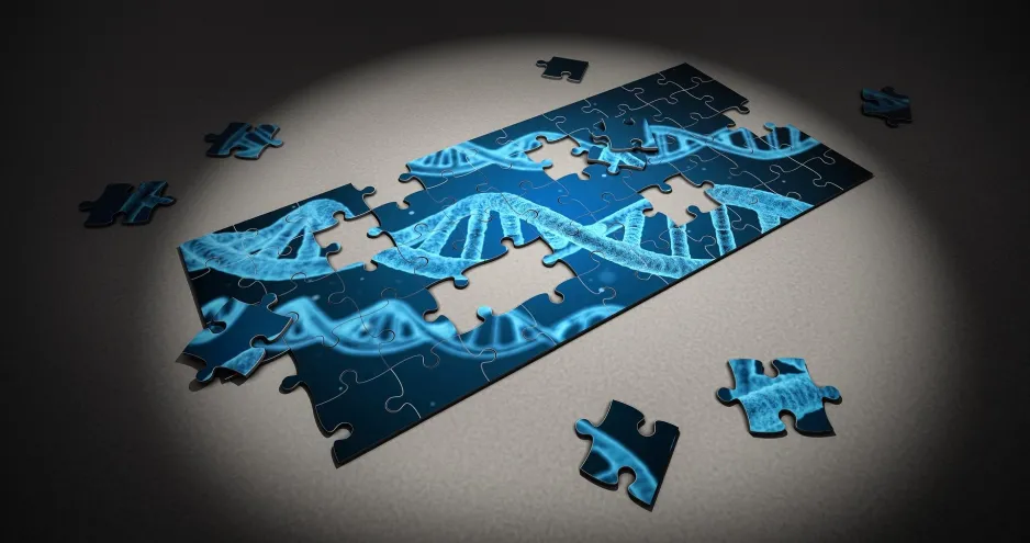 A half-finished puzzle with images of DNA strands