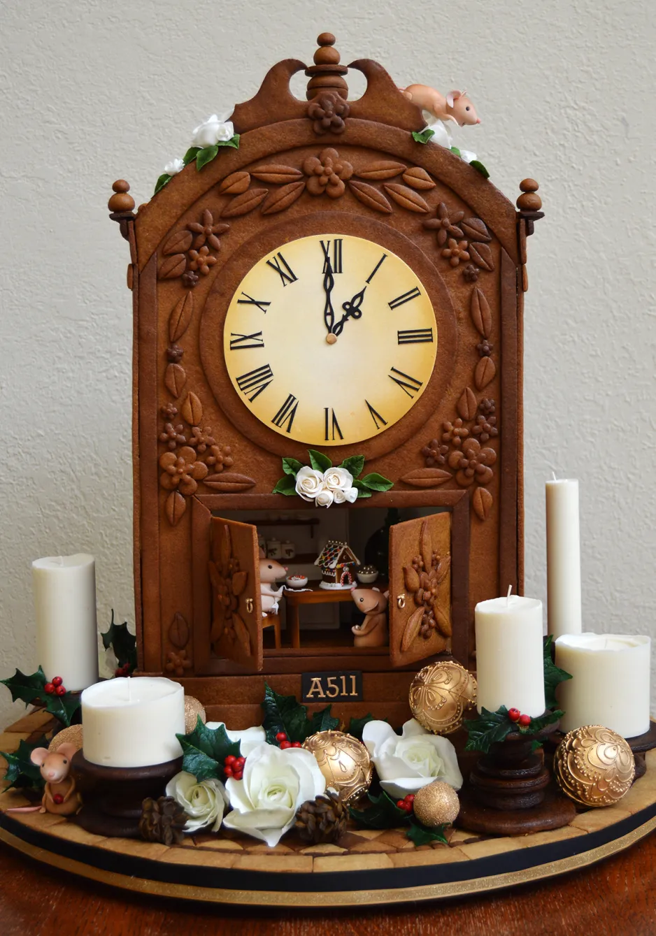 An antique-looking clock made entirely of gingerbread, with sugar decorations.