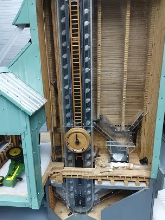 View of the lower level of the model, and the belt and bins for the grain flow.