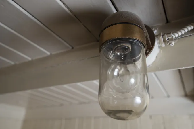 A close-up view of the light fixture inside the pilot house.